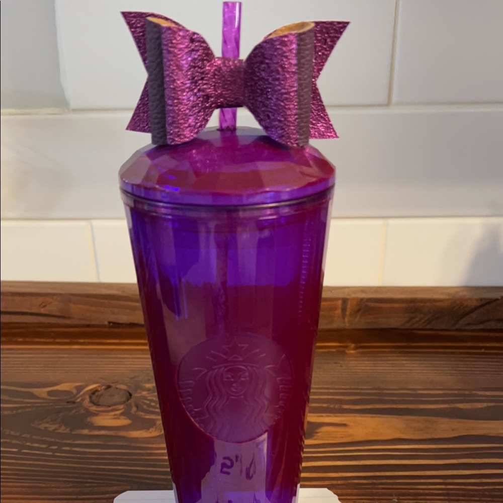 Purple Starbucks dome tumbler with bow.